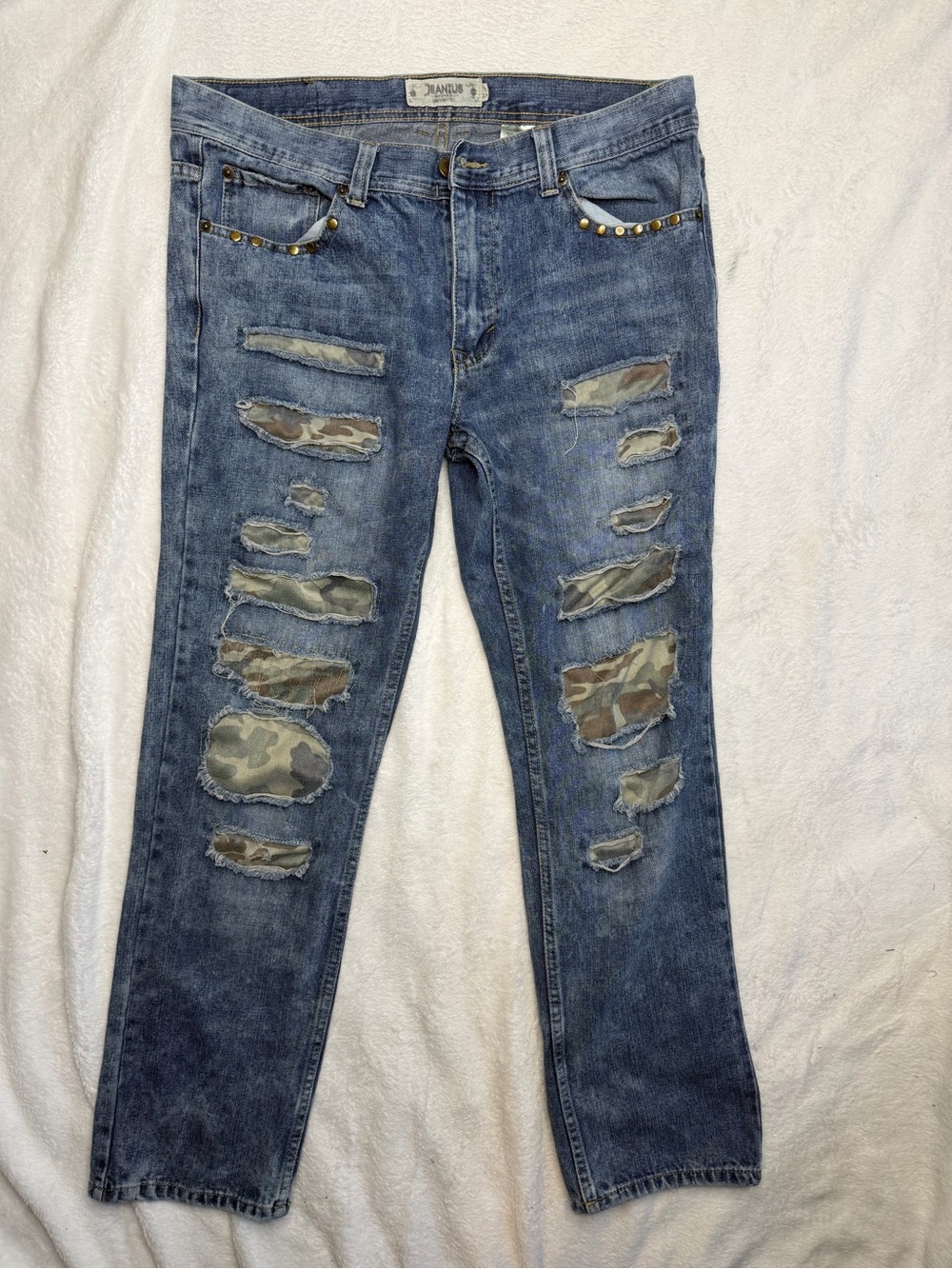 Akademiks Blue Distressed Jeans with Camo Patch and Stud Accents